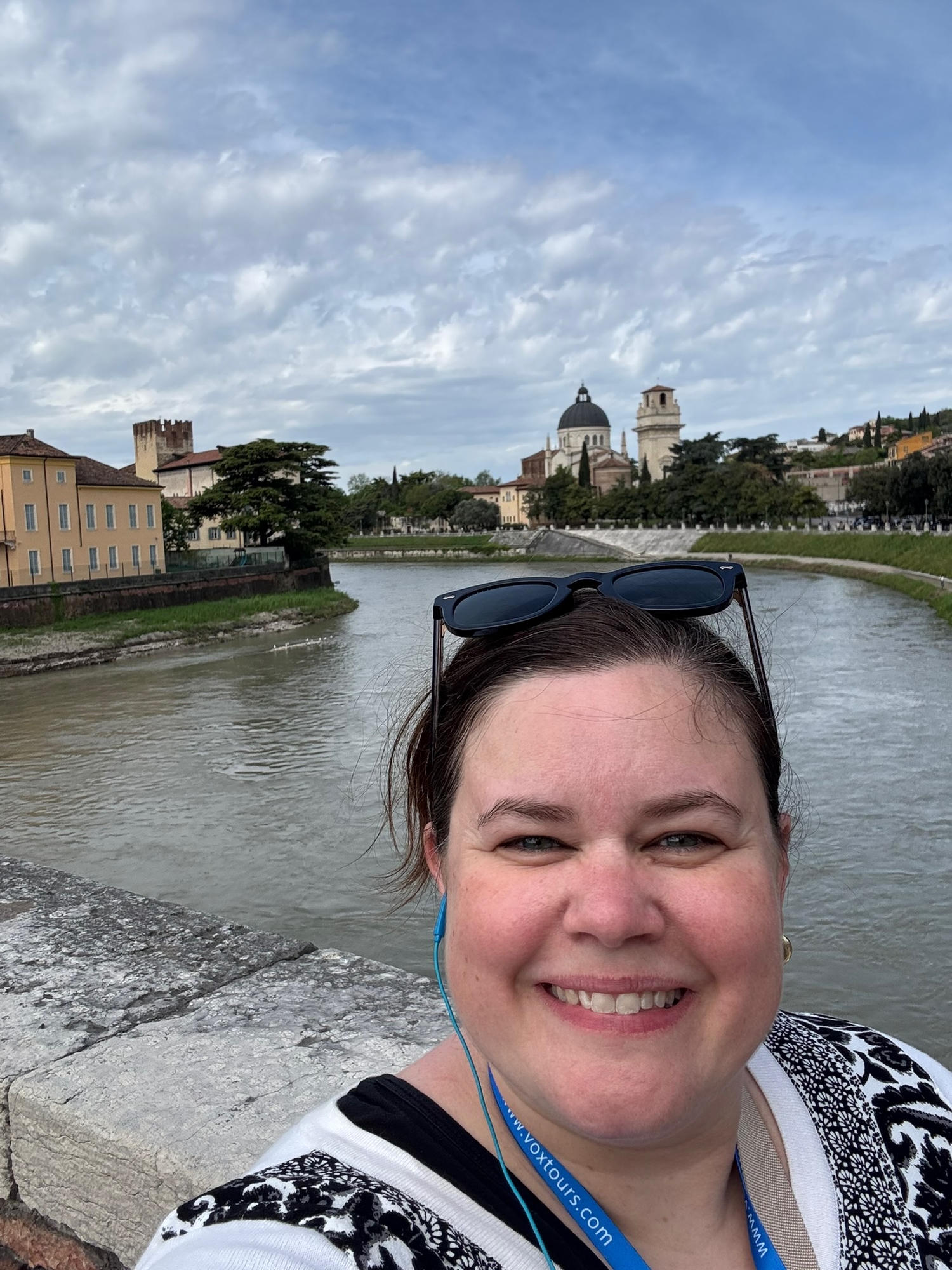Nicole Burnett beside the Adige River in Verona, Italy