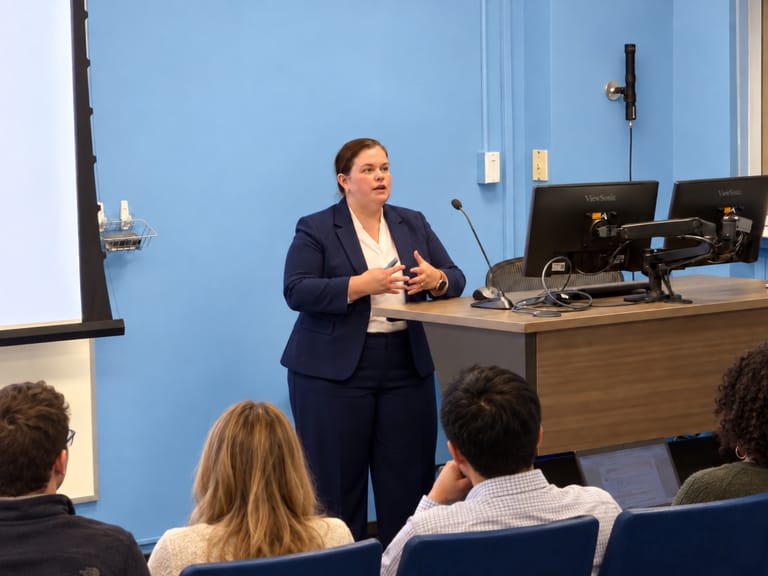 Nicole Burnett presenting to a leadership audience.
