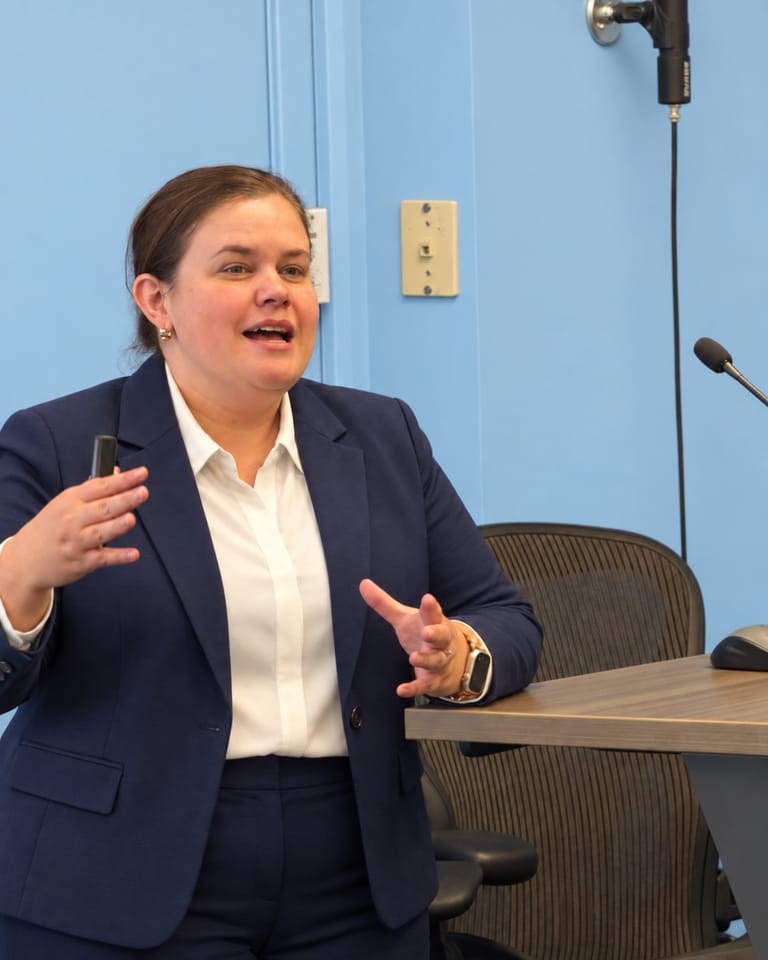 Nicole Burnett speaking during a leadership presentation.